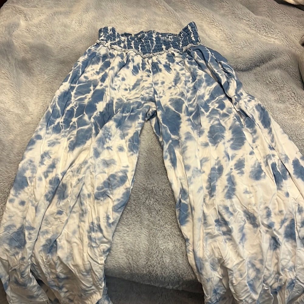 Beautiful white and blue flare pants. Never worn. Purchased a few months ago!